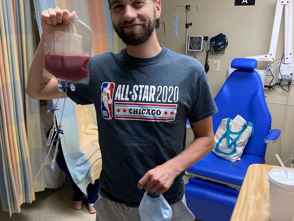 Ransom donor holding blood bag Ransom donor holding blood bag
