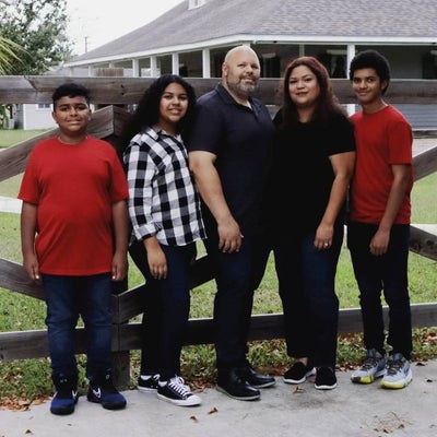 Royce with his wife, Trini, and his 3 children (from left to right), Tyson, Trishelle and Royce.