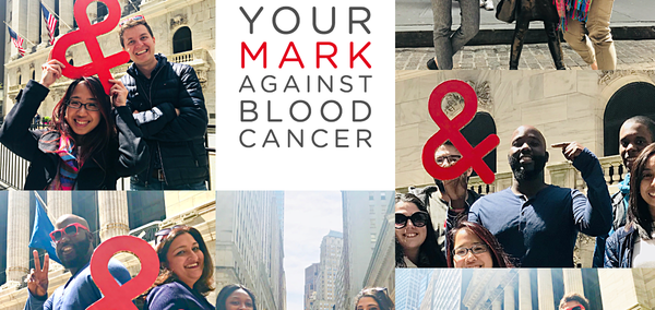 Individuals celebrating world blood cancer day by holding the ampersand symbol. 