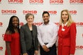 DKMS stem cell donor, Jasmine Thompson, Transplant recipient, Kristi Martin, Transplant Physician, Dr. Nilay Shah, and DKMS Global CEO, Dr. Elke Neujahr standing in front of a DKMS logo banner at the Charlotte Media event. 