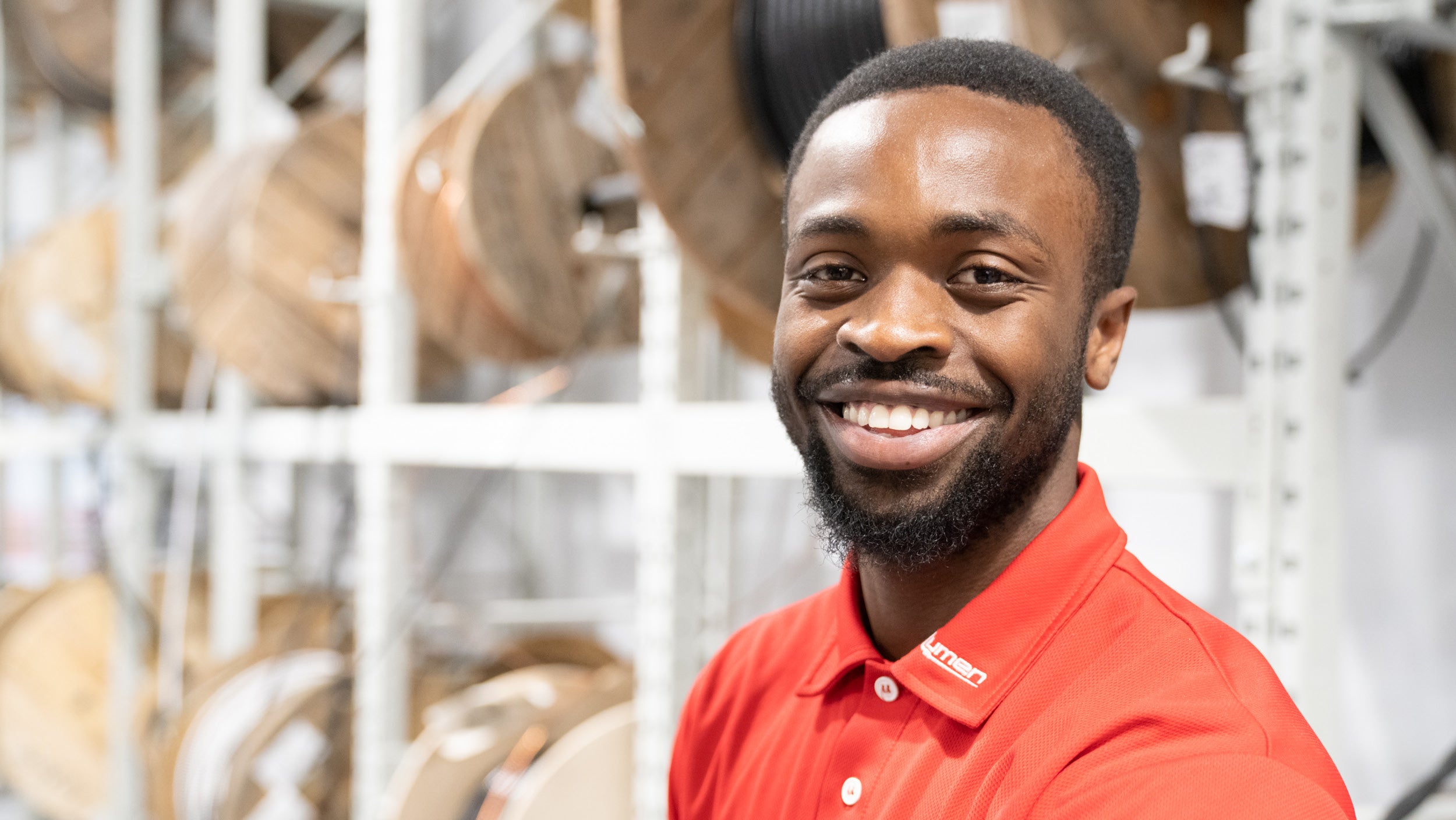 A Lumen employee in the wires and cables section of the distribution centre