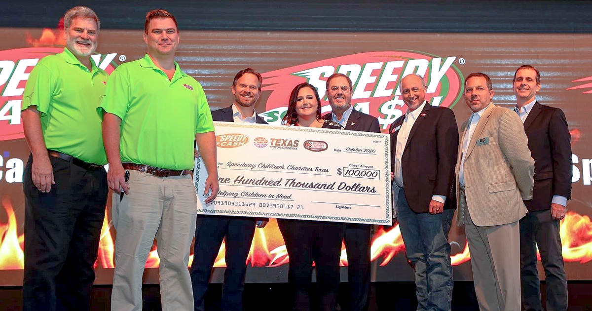 Speedy Cash Donation Speedy Cash donating to Speedway Children’s Charities.