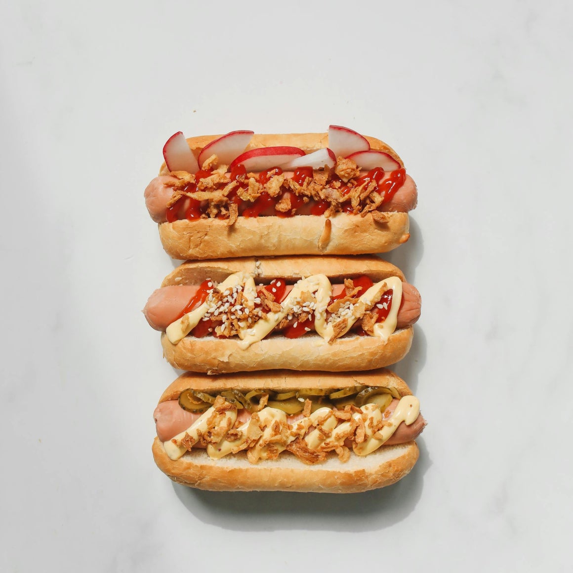Love a crispy outside on your frank? Pan frying hot dogs browns them up just right.