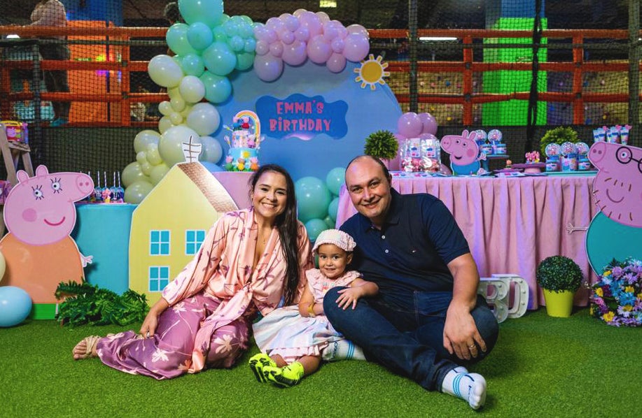 Felipe Botero and his wife and daughter at her birthday party. 