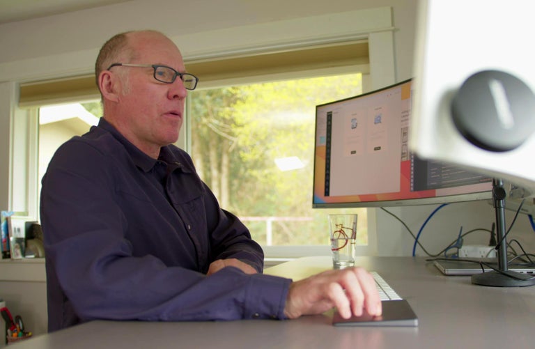 Steve Brain working from home in his new house. 