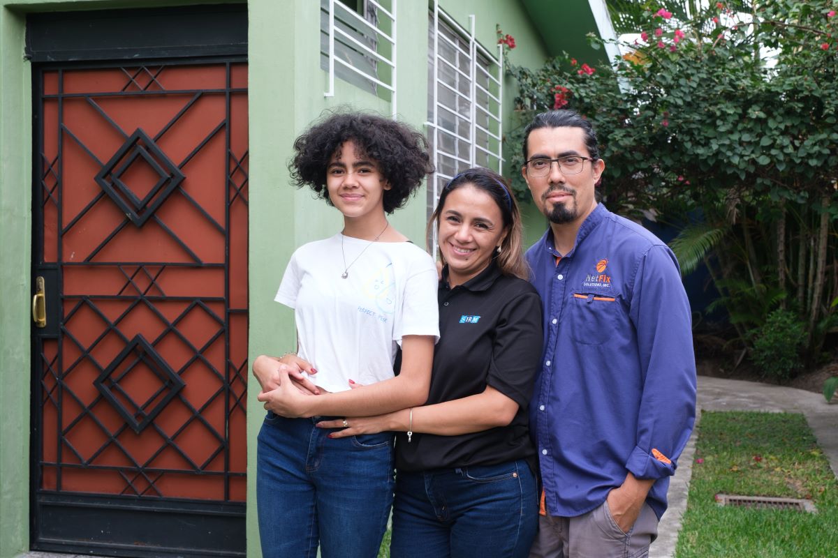 Gabriela with her family in El Salvador