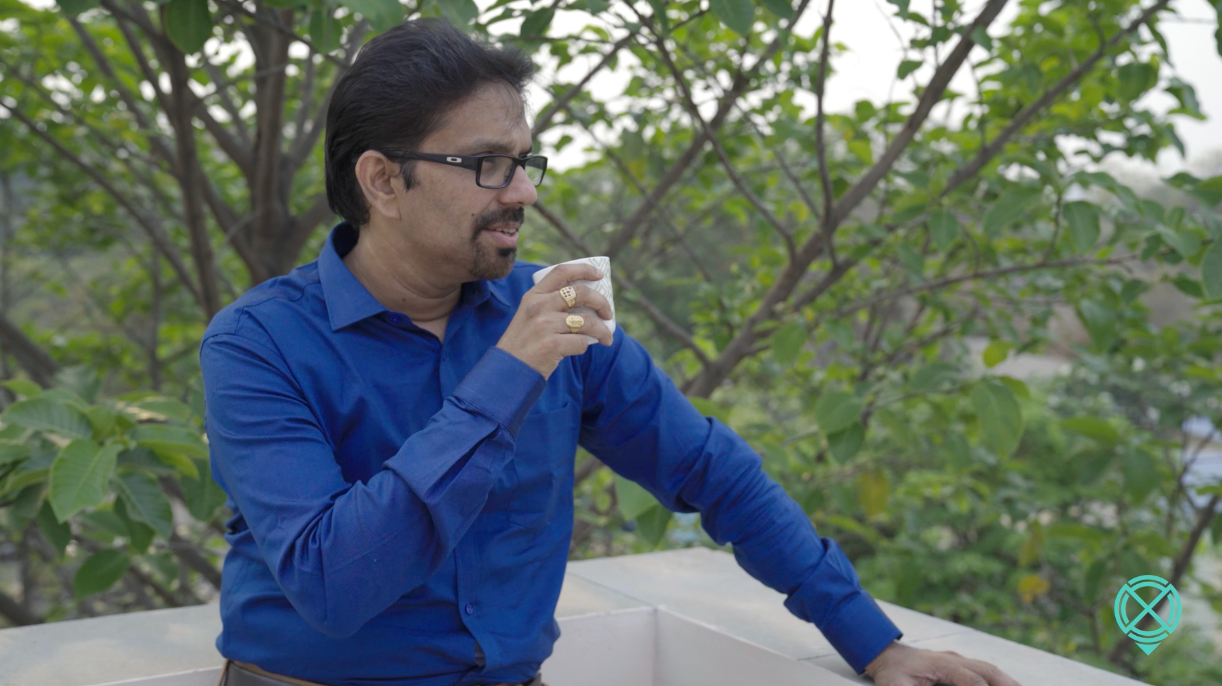 Raghu Punnamraju drinking coffee