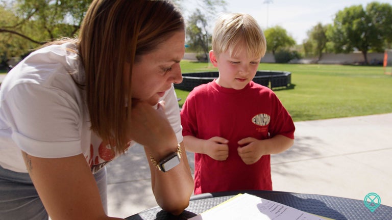 Holly helping a student one-on-one.