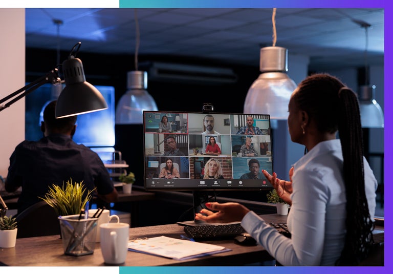 Remote team collaboration. Woman on Zoom call with colleagues.