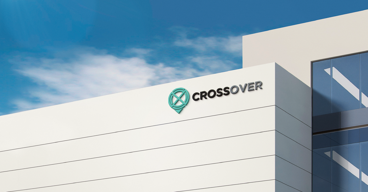 Modern architectural detail of a building with 'CROSSOVER' logo