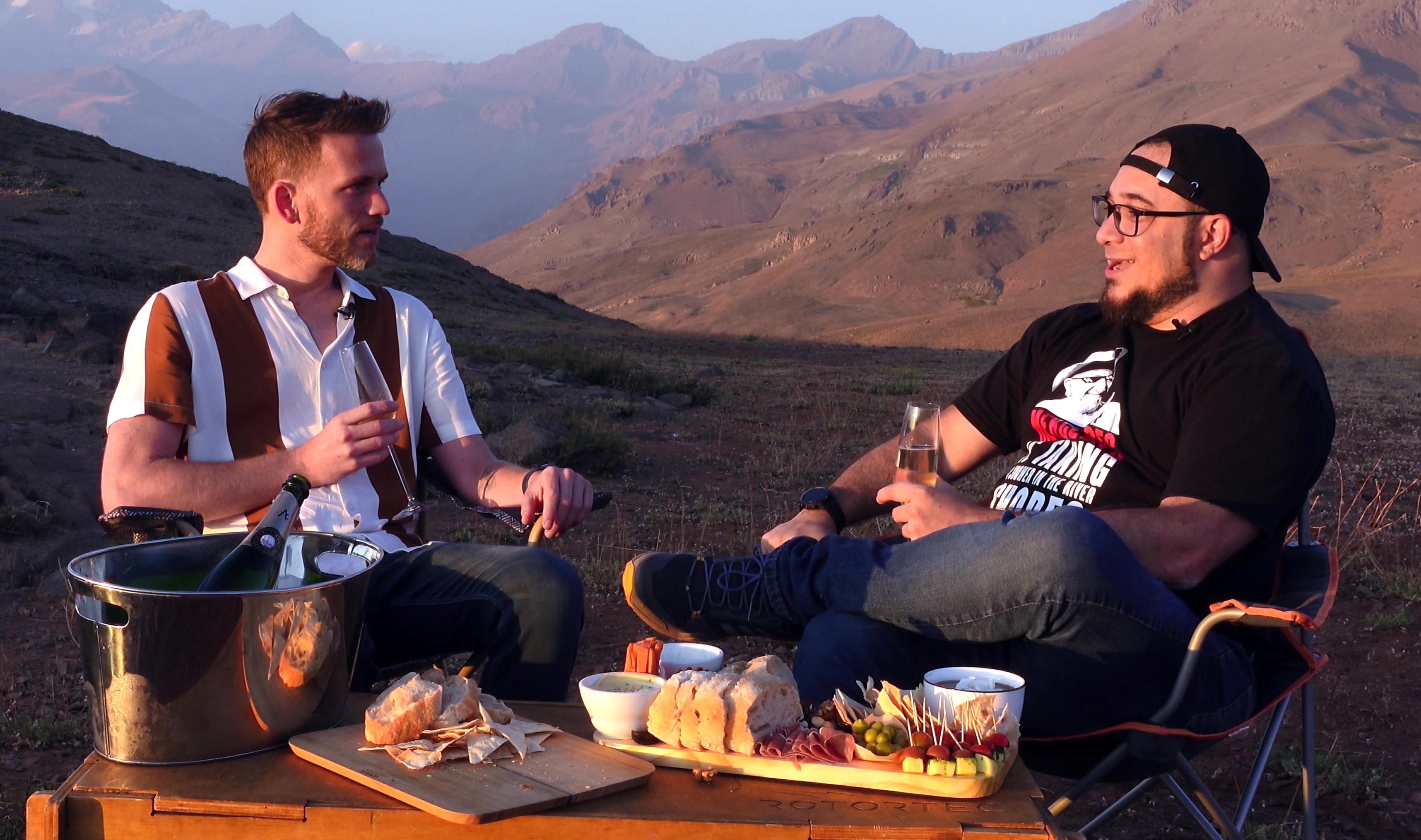 Andrew Allen and Xavier having a picnic on top of the Andes.