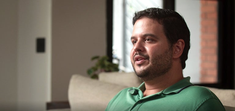 Leonardo Lima talking during the interview at home. 