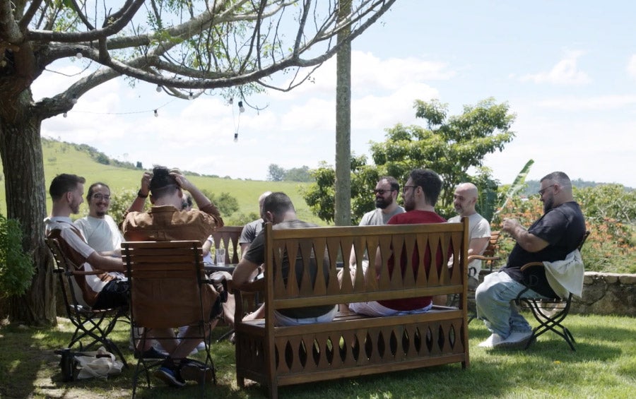 A group of Crossover remote workers chatting in Brazil