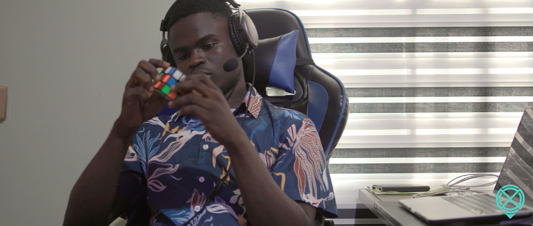 Using a rubik's cube to keep his brain sharp