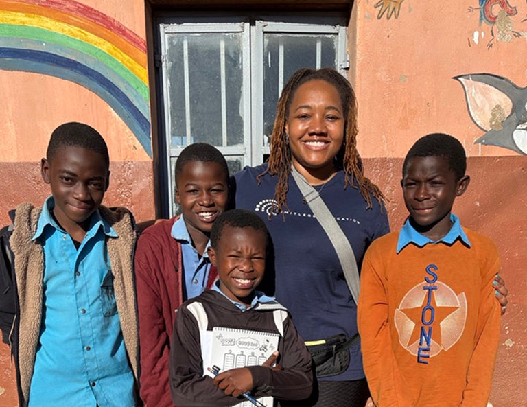Ty in Malawi with some of the students