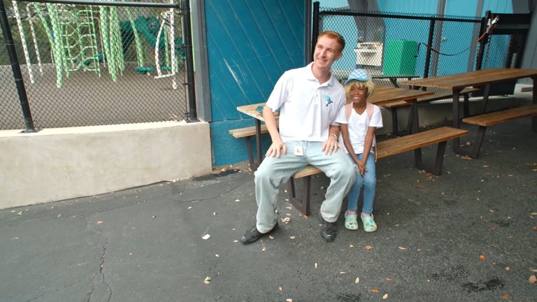 Carson with a student at Alpha.