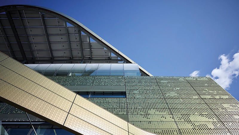 Close-up of Bloomberg Centre's exterior rainscreen layer, an aluminum panel system that decreases the buildings cooling load.