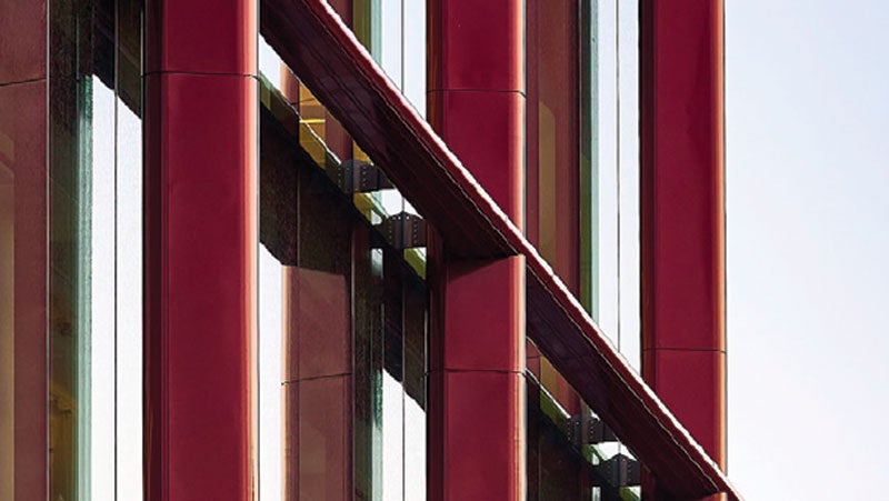 Close-up cladding of the Bulletin Building uses a deep cherry PPG powder coating with sparkling effect