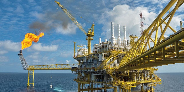 An offshore oil site with controlled fire. PPG provides a range of high-performance coatings for the oil & gas industry.