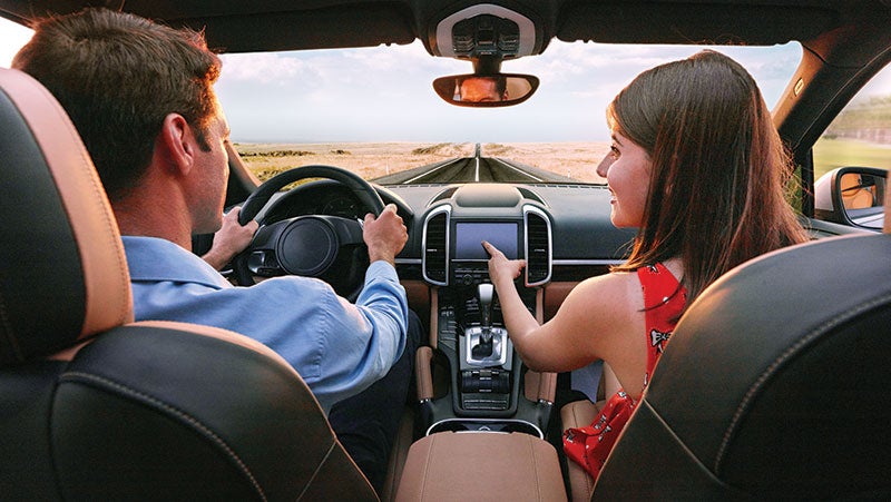 Multi-seat car with touch-screen stereo protected by PPG conductive coatings