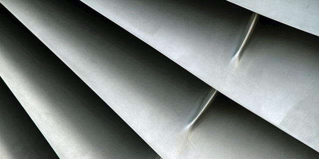 Close-up of silver sharp metal structure with edges protected by ENVIROCRON™ Extreme Protection Edge powder coating.
