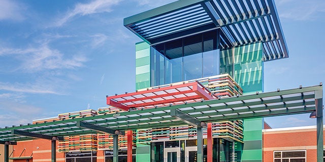 Building with colorful metal extrusions.