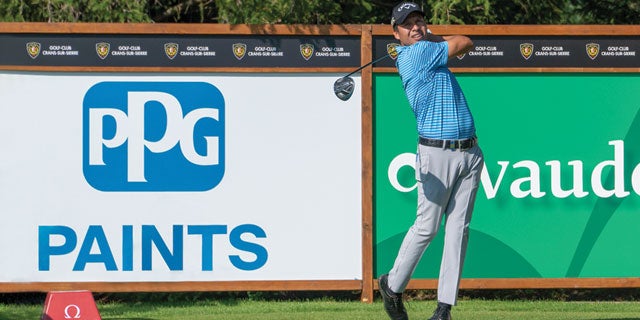 Golfer taking part in Omega European Masters golf event sponsored by PPG paints.