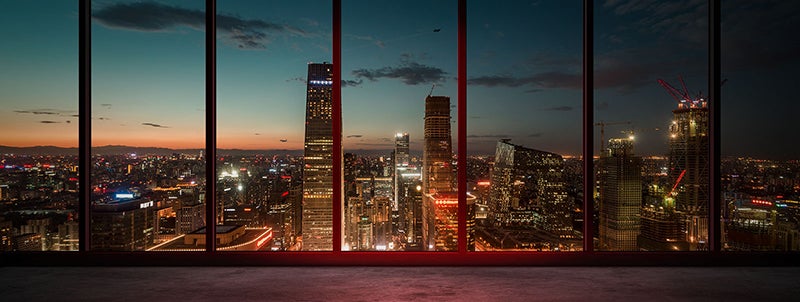 View of buildings at dusk from a skyscraper
