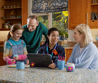 Family chatting to service engineer
