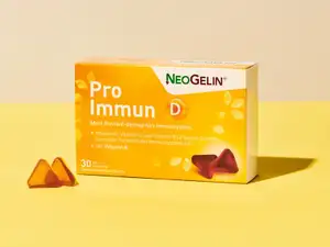 Packung von NeoGelin Pro Immun vor gelbem Hintergrund.