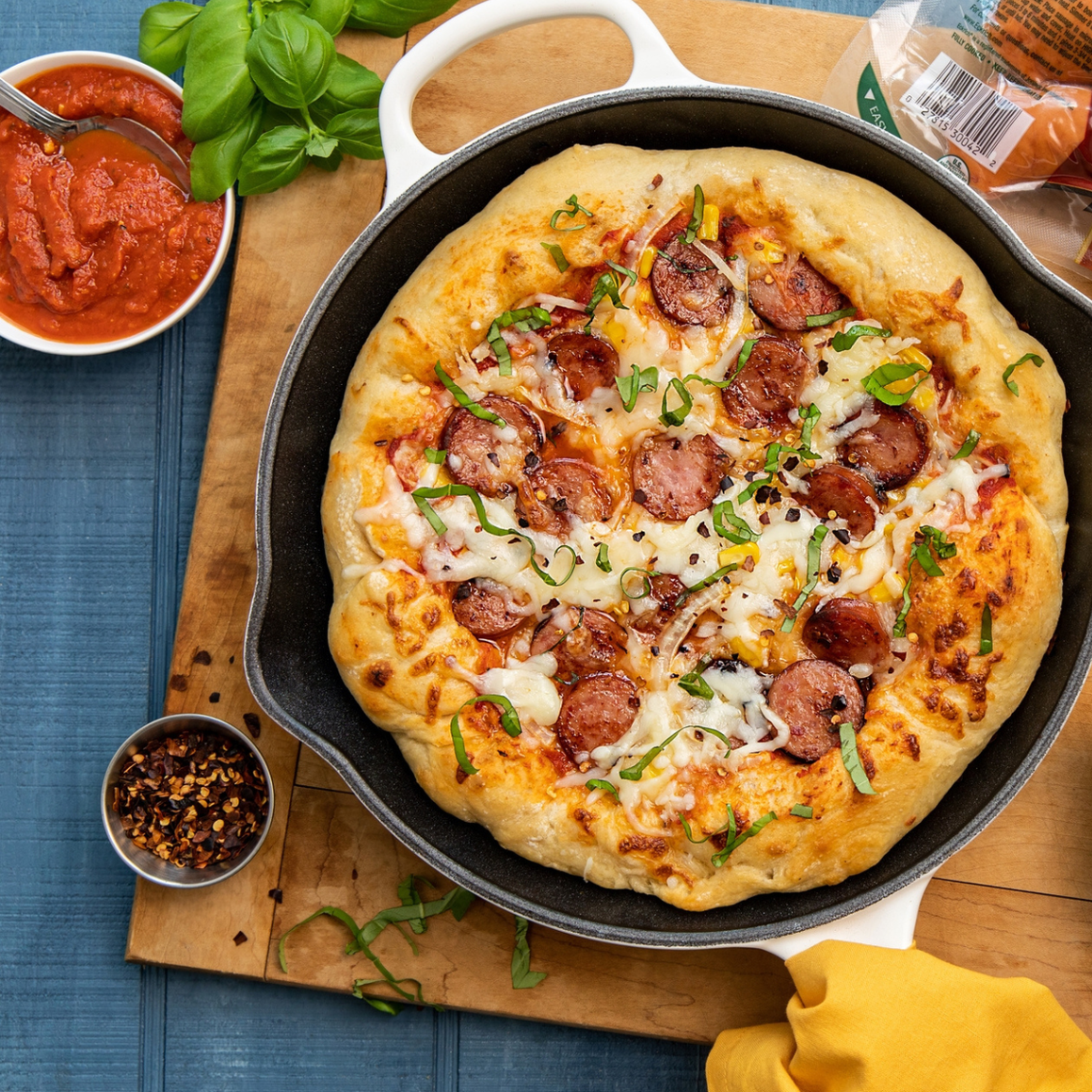 Skillet pizza on the campfire?!?! Sounds wild, but it works. Pile on the Eckrich® Smoked Sausage, add some corn kernels and fresh basil, and prepare on the grill or in a skillet over the fire in no time.