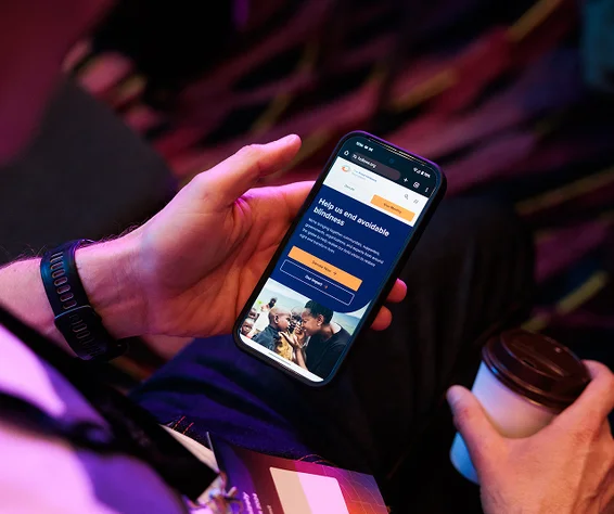 holding a mobile phone