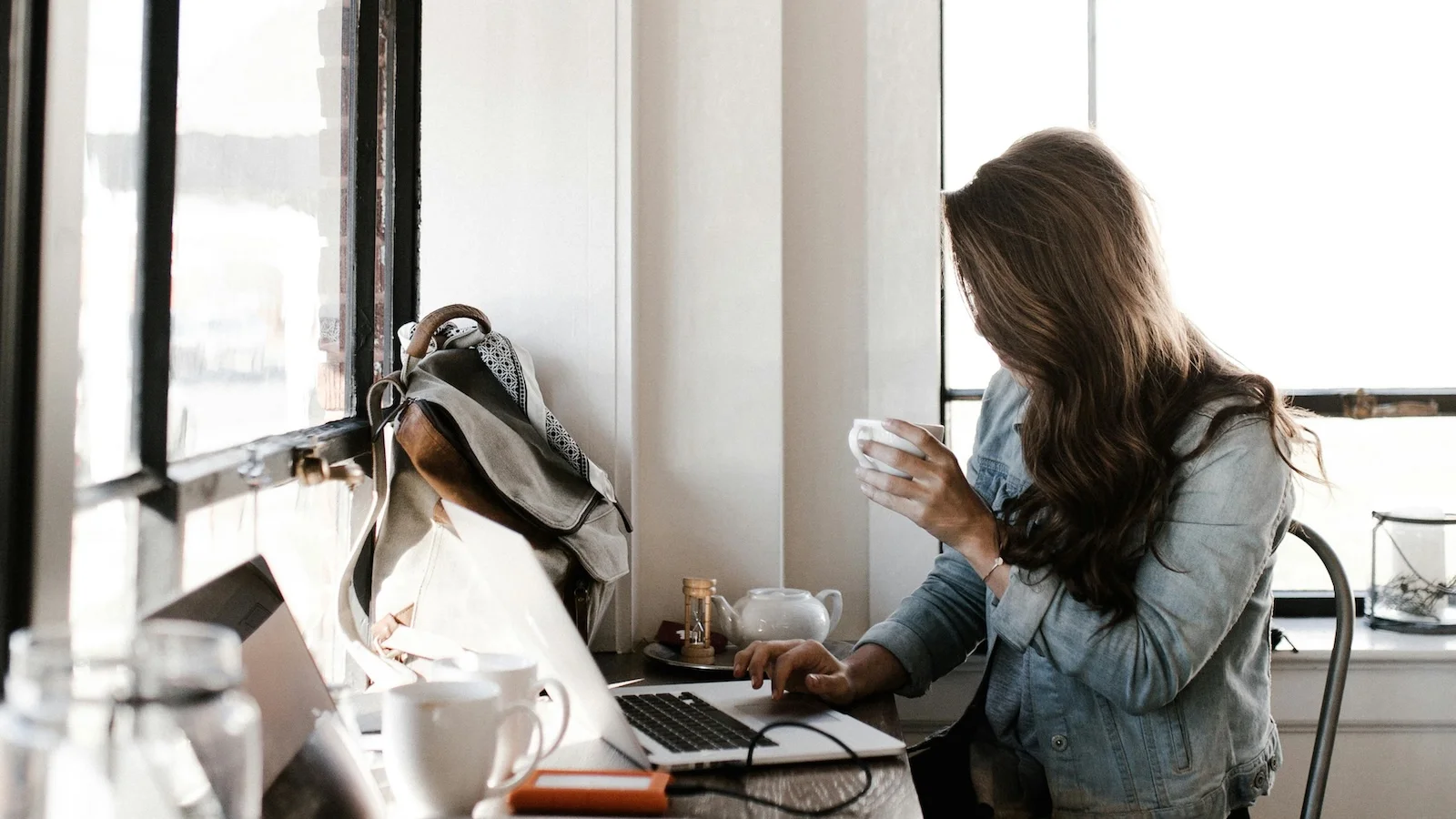 Woman typing on laptop