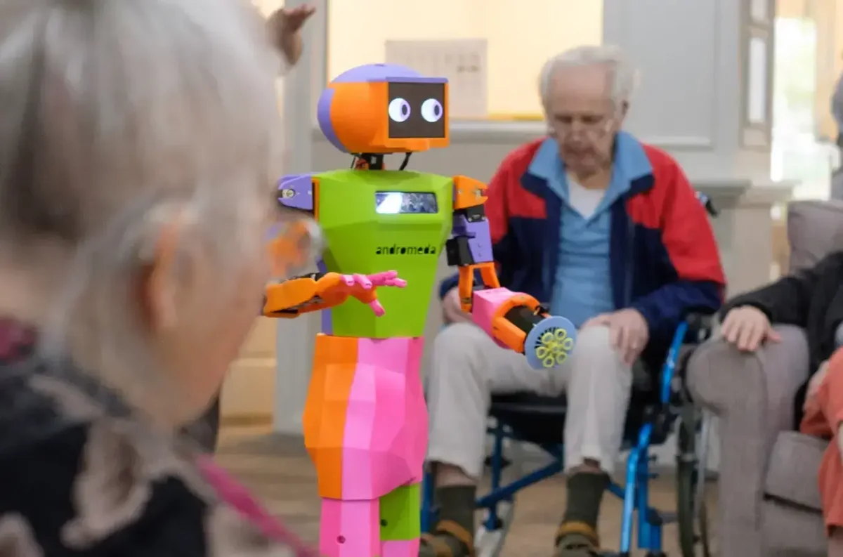 Coloured robot in care home