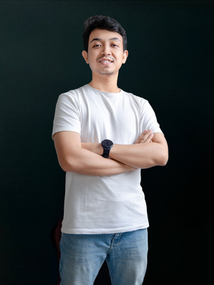 Picture of Rifa standing against a black background