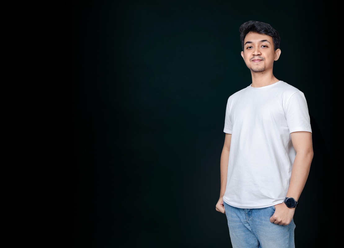 Picture of Rifa standing against a black background