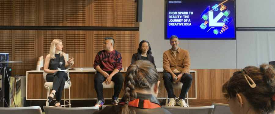 people sitting in front of audience presenting