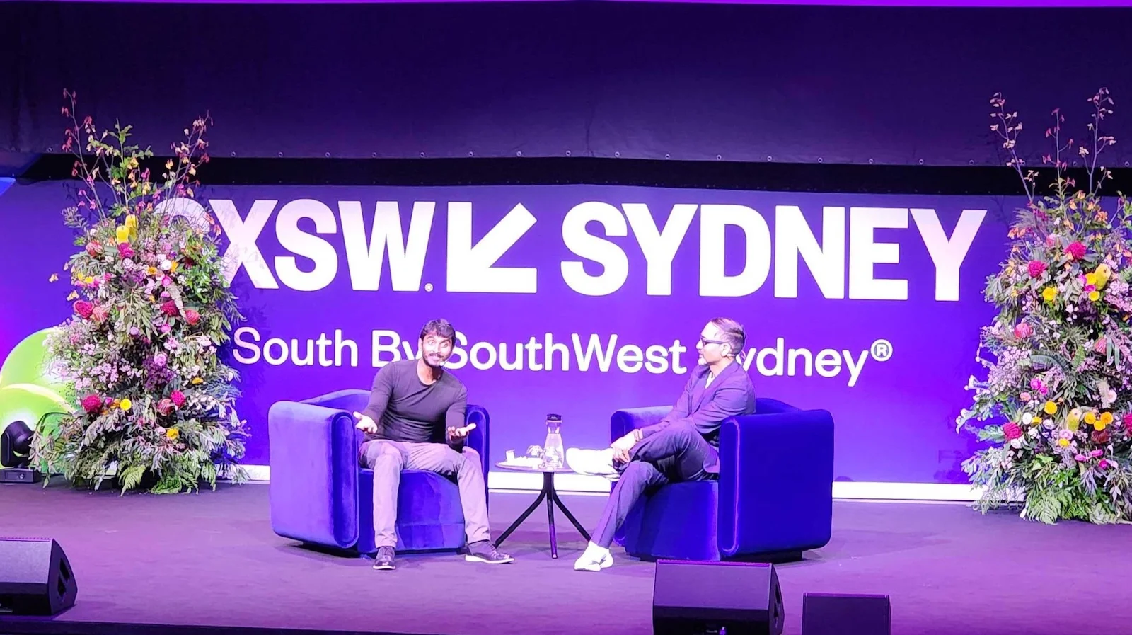 Manohar Paluri with Ryan Patel talking at SXSW Sydney 2024.