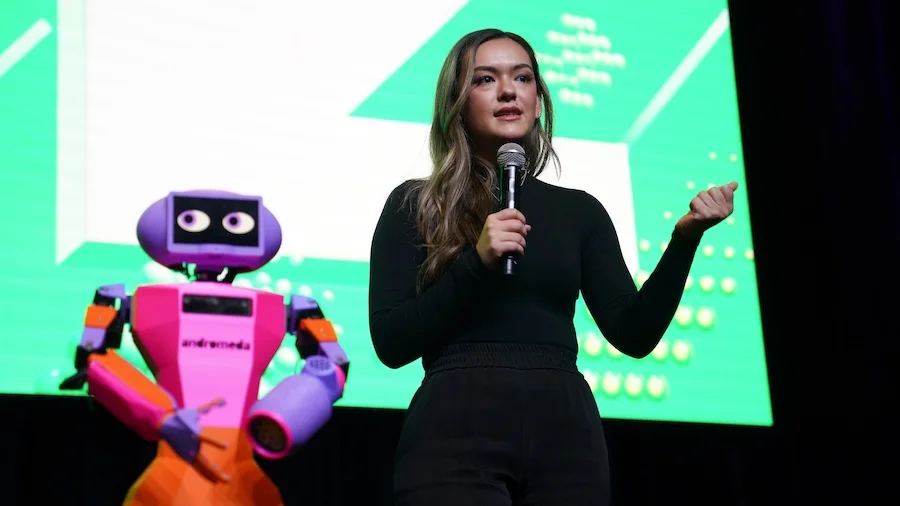 Grace Brown with 'Abi' the robot