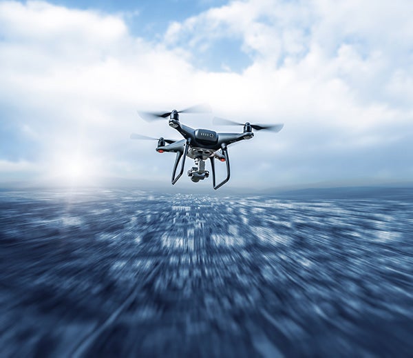 A drone flying over water