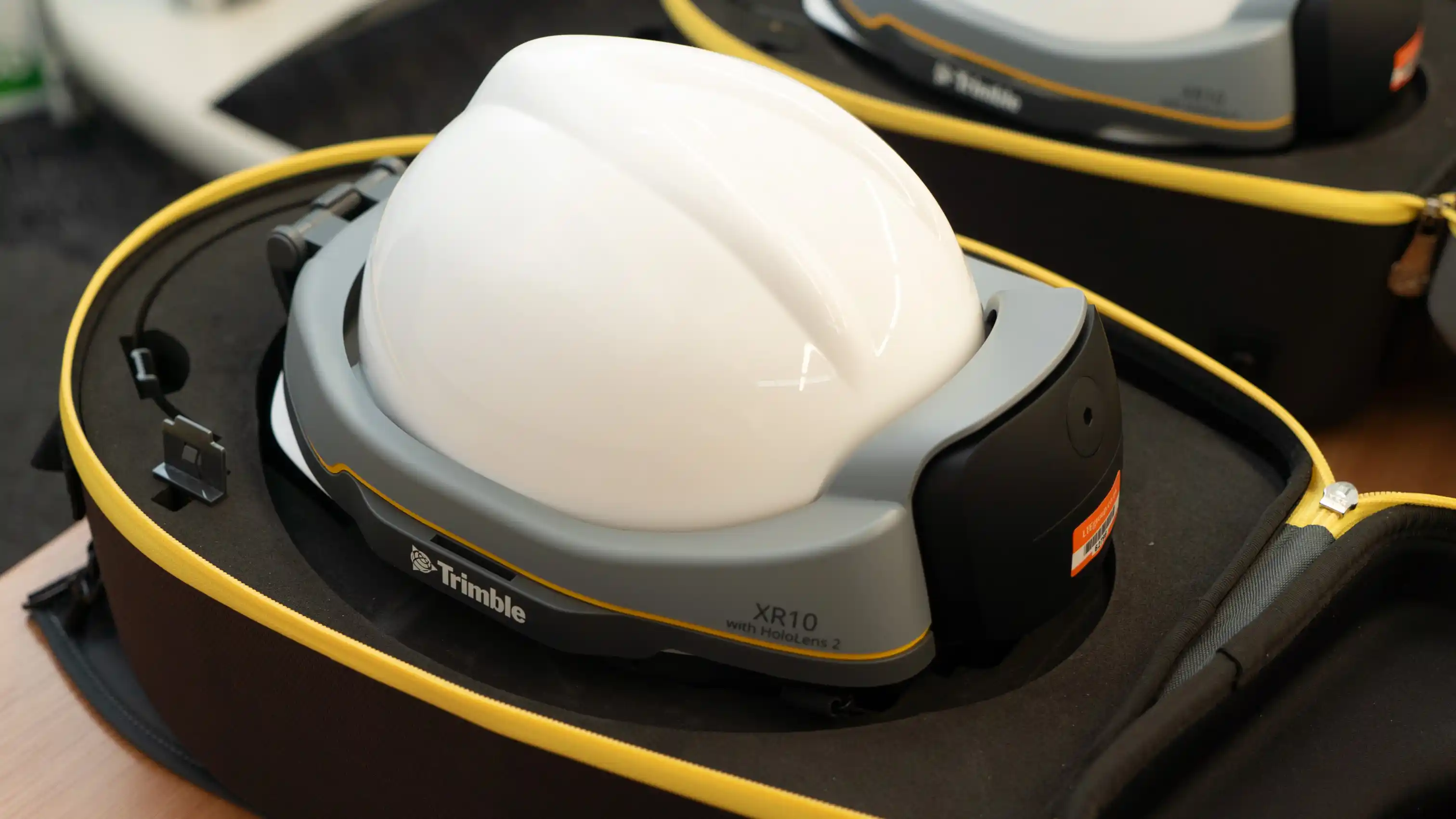 Hard hat with integrated augmented reality headset