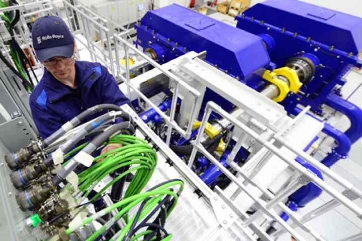 An engineer working on electrical equipment