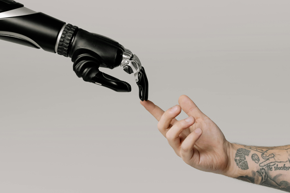 Robot and human touching finger