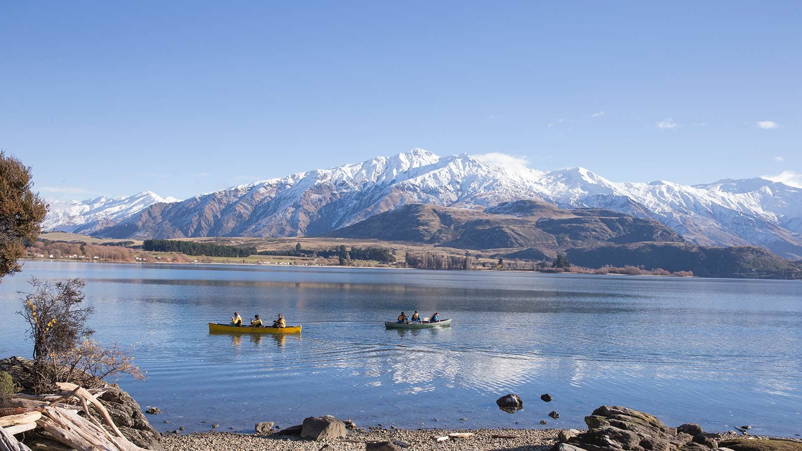 People canoeing in New Zealand river