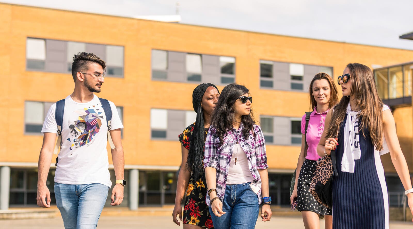 Surrey students walking on campus