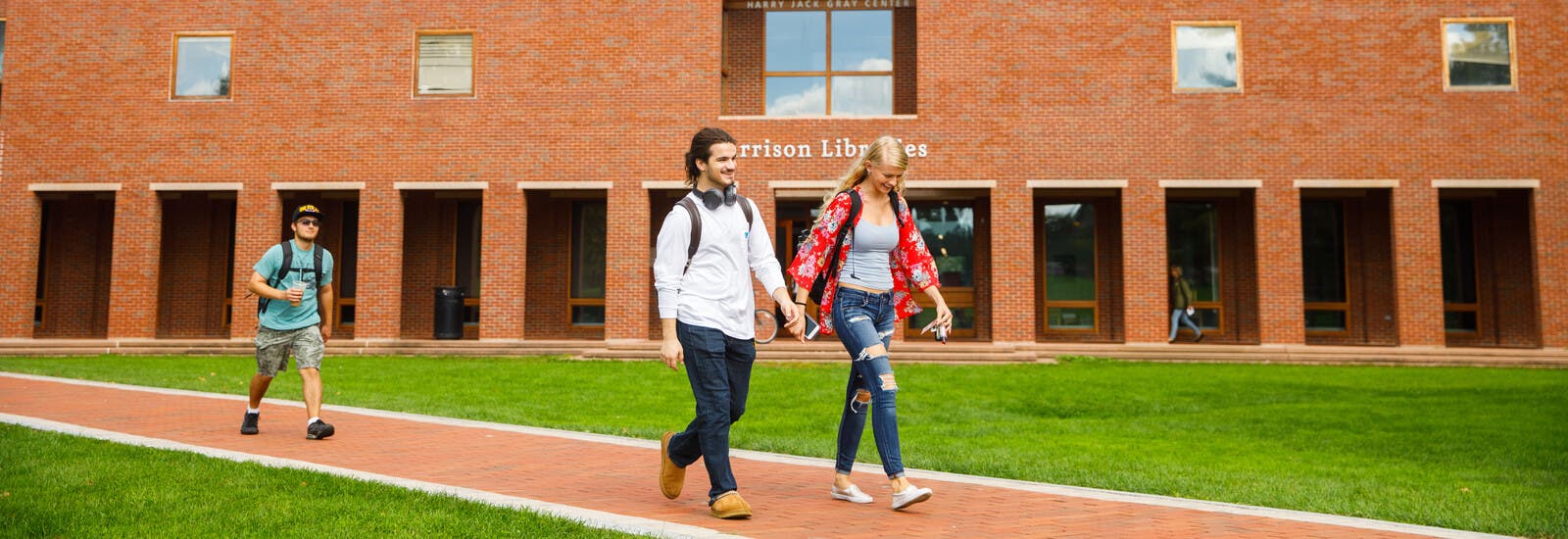 Students walking outside campus building