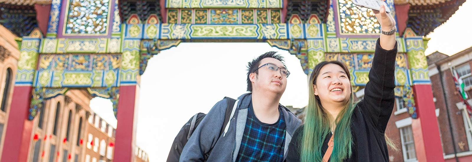 Two students in Liverpool's Chinatown.