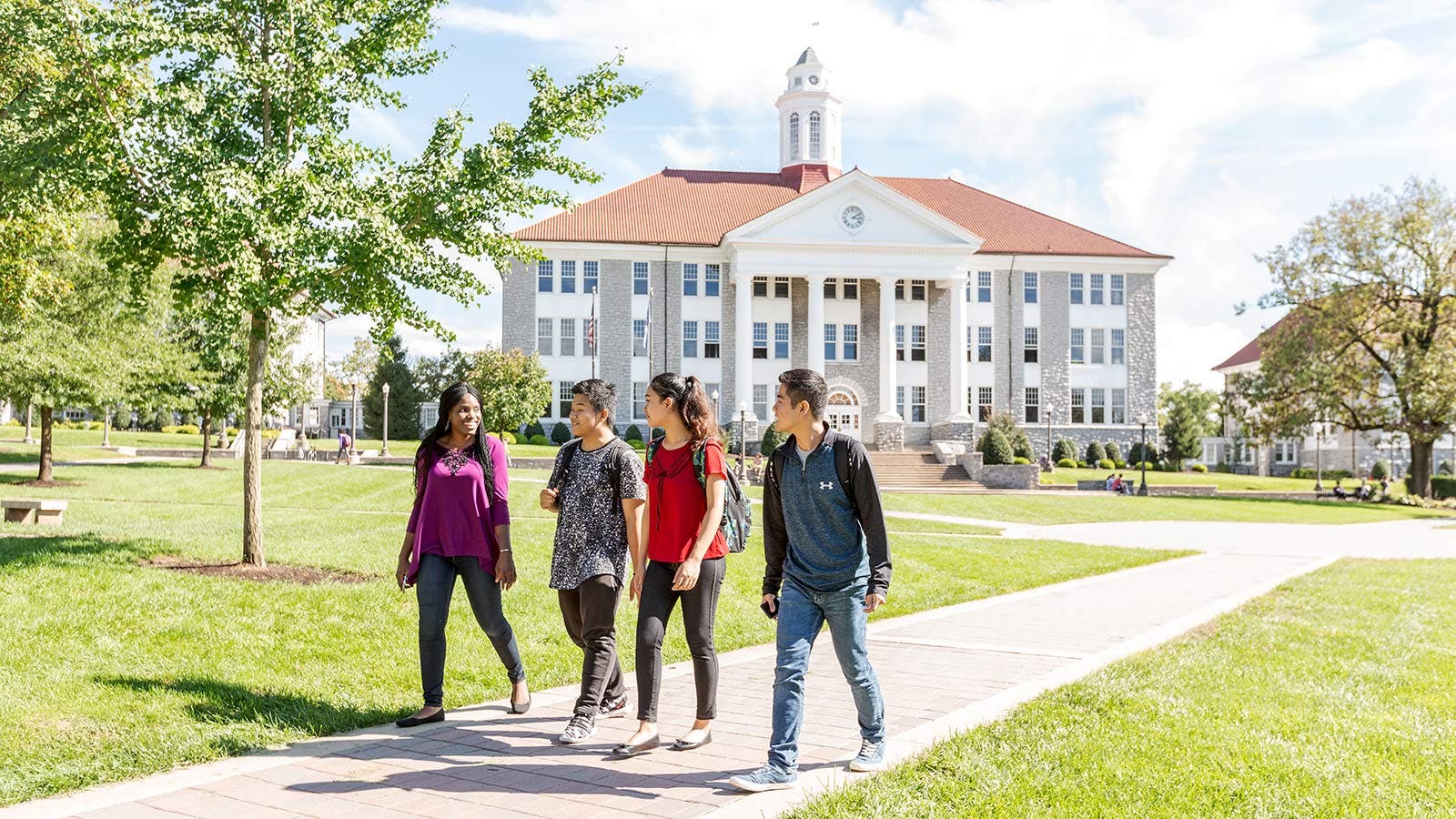 James Madison University students walking through campus