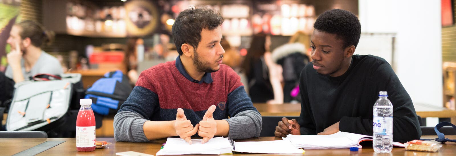 Students working in a cafe