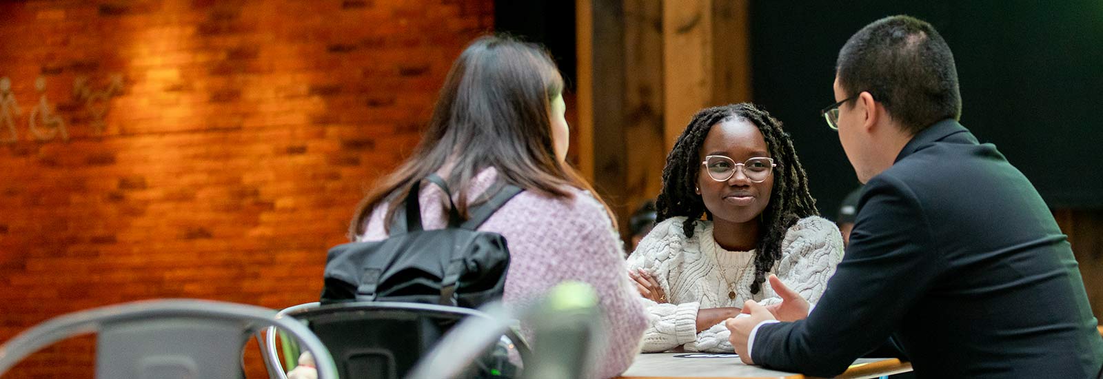 Students chatting together in a communal space